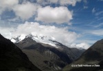 Peaking up out of the clouds is Huascaran, the highest mountain in Peru