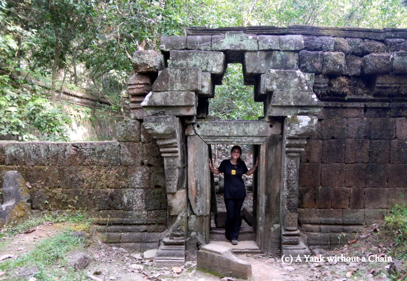 The Yank without a Chain inside a doorway at the Royal Palace within Angkor Thom
