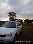 My car in the rest area at Home Hill, waking up with the sun